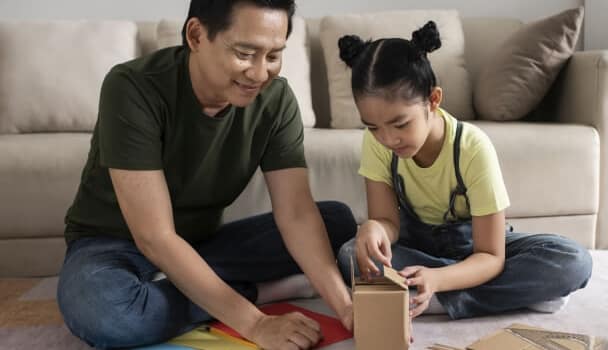 dad and daughter playing